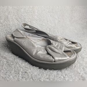 FLY LONDON Wedge women sandals size 37 = 6.5, 7 us color pale shinny gold